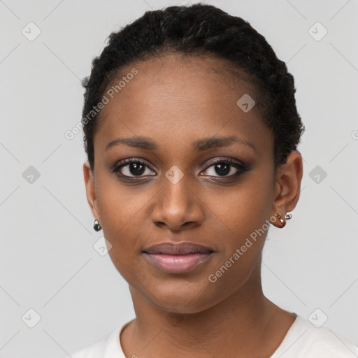 Joyful black young-adult female with short  black hair and brown eyes