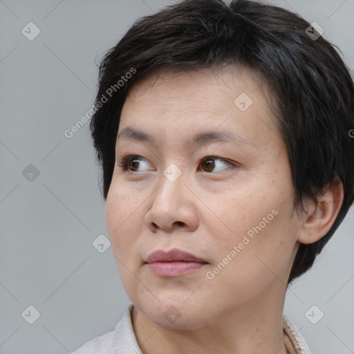 Neutral white adult female with medium  brown hair and brown eyes