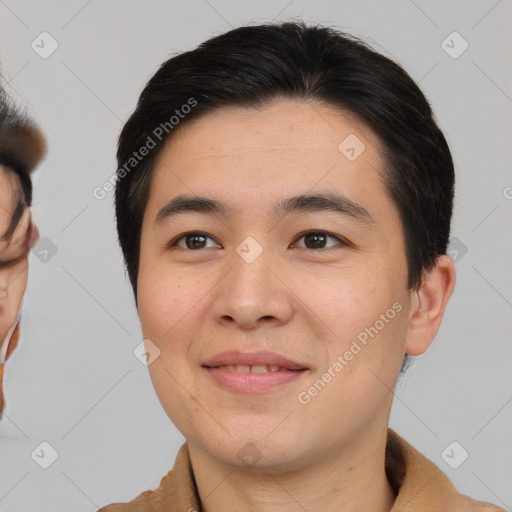 Joyful asian young-adult male with short  brown hair and brown eyes