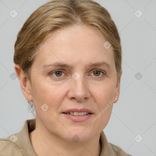 Joyful white adult female with short  brown hair and grey eyes