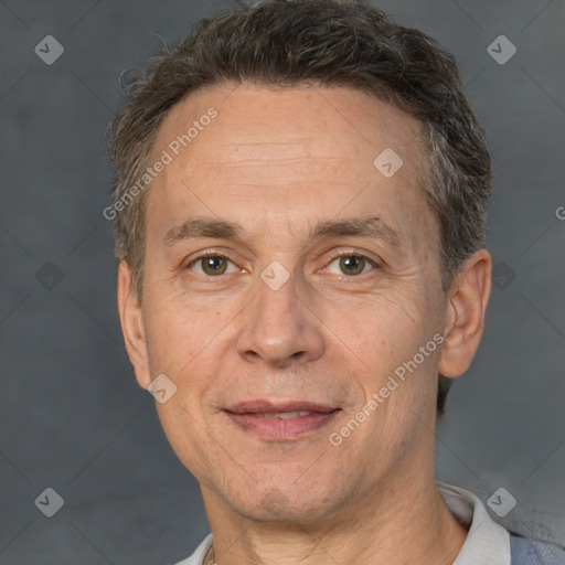 Joyful white middle-aged male with short  brown hair and brown eyes