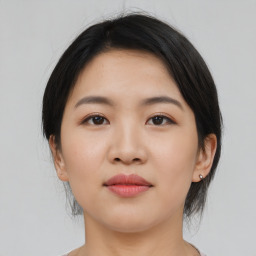 Joyful asian young-adult female with medium  black hair and brown eyes