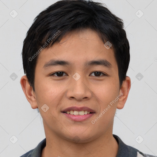 Joyful asian young-adult male with short  brown hair and brown eyes