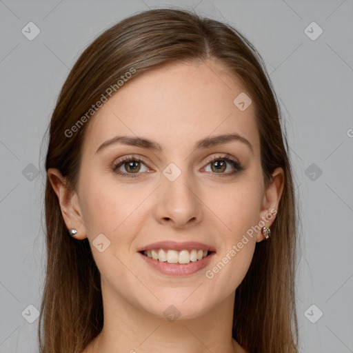 Joyful white young-adult female with long  brown hair and grey eyes