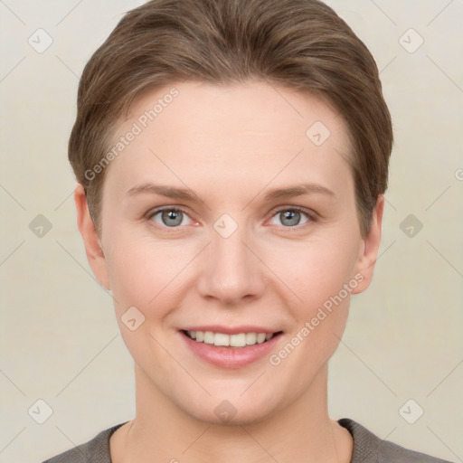 Joyful white young-adult female with short  brown hair and grey eyes