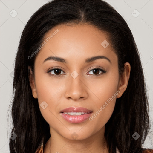 Joyful latino young-adult female with long  brown hair and brown eyes