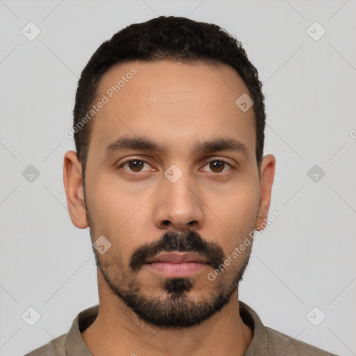 Neutral latino young-adult male with short  black hair and brown eyes