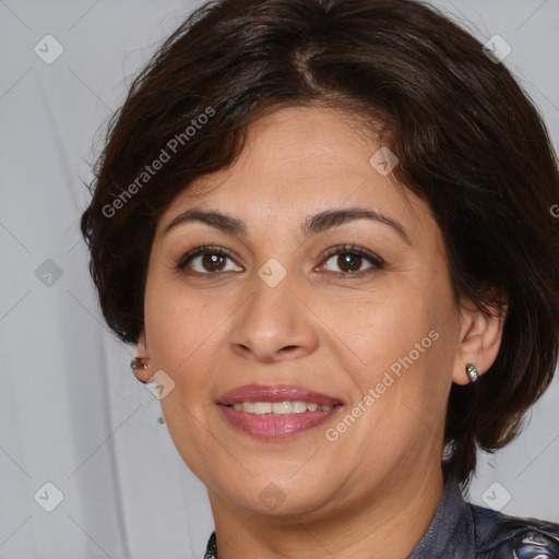 Joyful white adult female with medium  brown hair and brown eyes