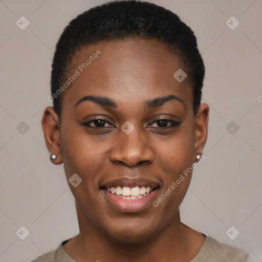 Joyful black young-adult female with short  black hair and brown eyes