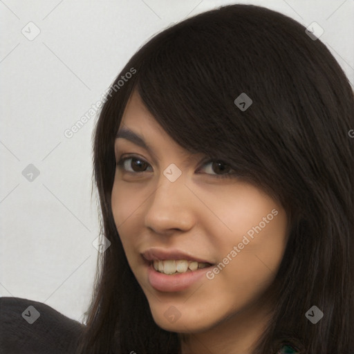 Joyful latino young-adult female with long  brown hair and brown eyes