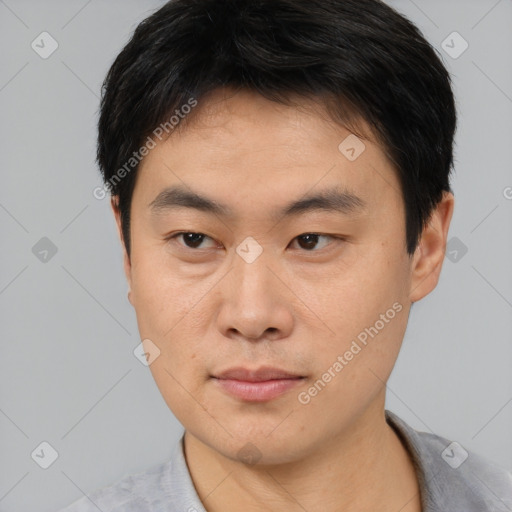 Neutral asian young-adult male with short  black hair and brown eyes