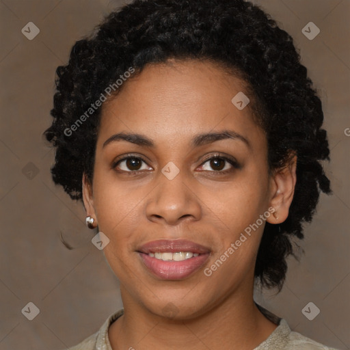 Joyful black young-adult female with short  black hair and brown eyes