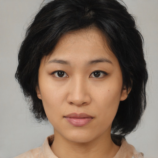 Neutral asian young-adult female with medium  black hair and brown eyes