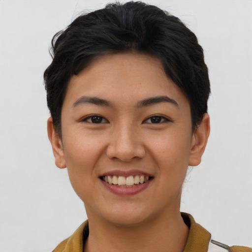 Joyful asian young-adult female with short  brown hair and brown eyes