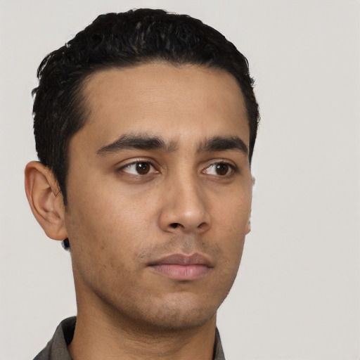 Neutral latino young-adult male with short  black hair and brown eyes