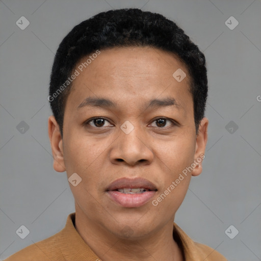Joyful latino young-adult male with short  black hair and brown eyes