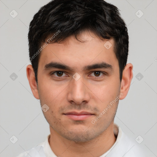 Neutral white young-adult male with short  brown hair and brown eyes