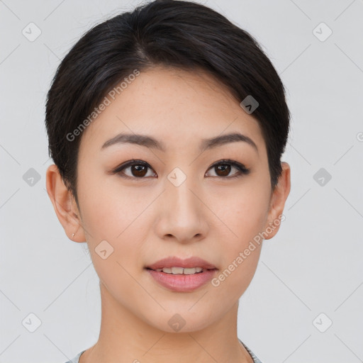 Joyful asian young-adult female with short  brown hair and brown eyes