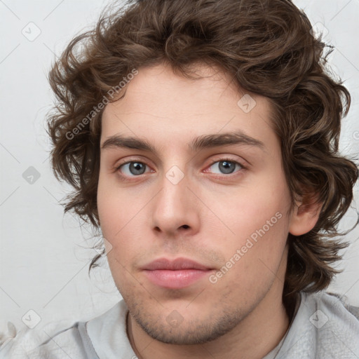 Neutral white young-adult male with medium  brown hair and brown eyes