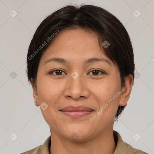 Joyful white adult female with short  brown hair and brown eyes