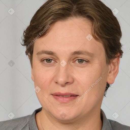 Joyful white adult female with short  brown hair and brown eyes