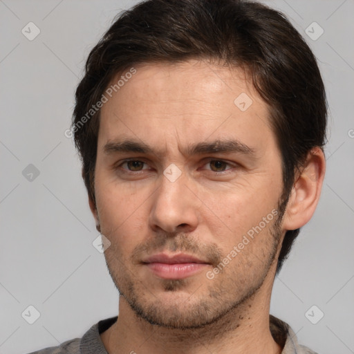 Neutral white adult male with short  brown hair and brown eyes