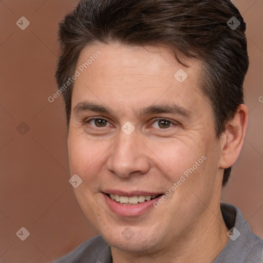 Joyful white adult male with short  brown hair and brown eyes