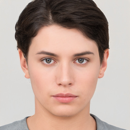 Neutral white young-adult female with short  brown hair and brown eyes