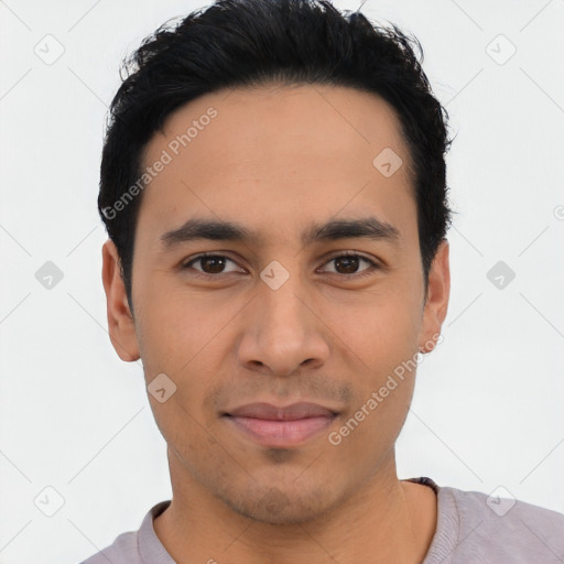 Joyful asian young-adult male with short  black hair and brown eyes