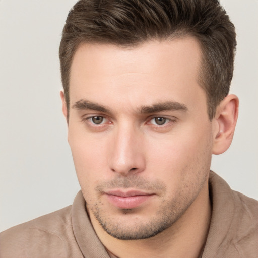 Neutral white young-adult male with short  brown hair and brown eyes