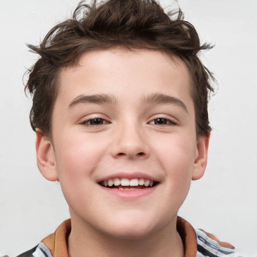 Joyful white child male with short  brown hair and brown eyes