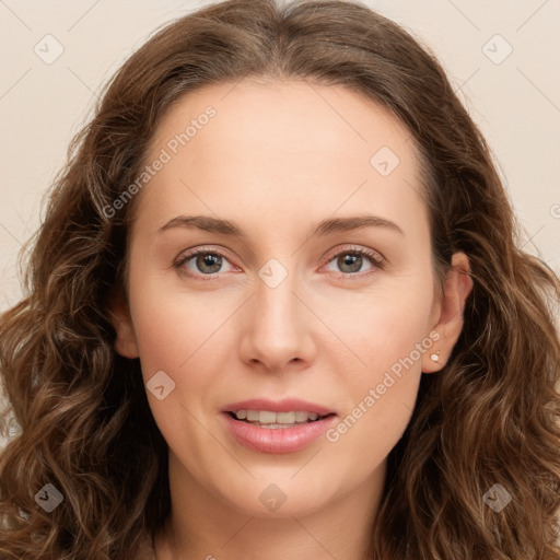 Joyful white young-adult female with long  brown hair and green eyes