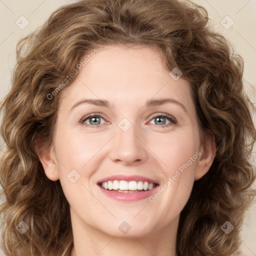 Joyful white young-adult female with medium  brown hair and green eyes