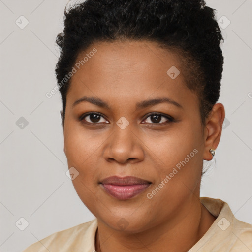 Joyful black young-adult female with short  brown hair and brown eyes