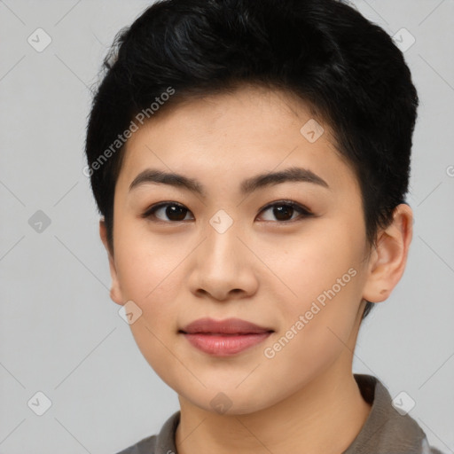 Joyful asian young-adult female with short  black hair and brown eyes