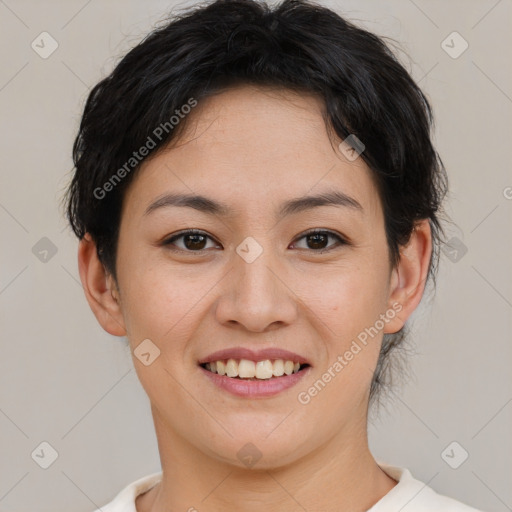 Joyful asian young-adult female with short  brown hair and brown eyes