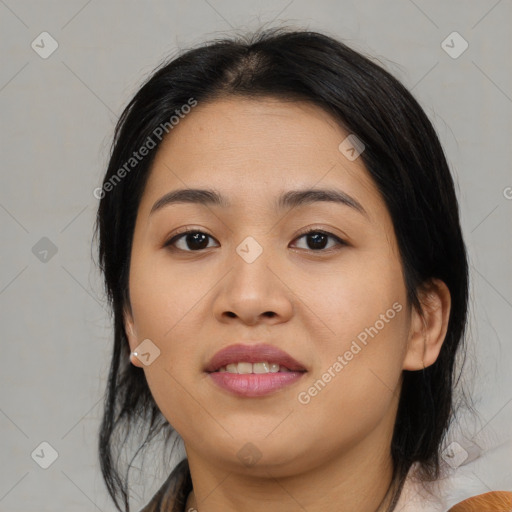 Joyful asian young-adult female with medium  black hair and brown eyes