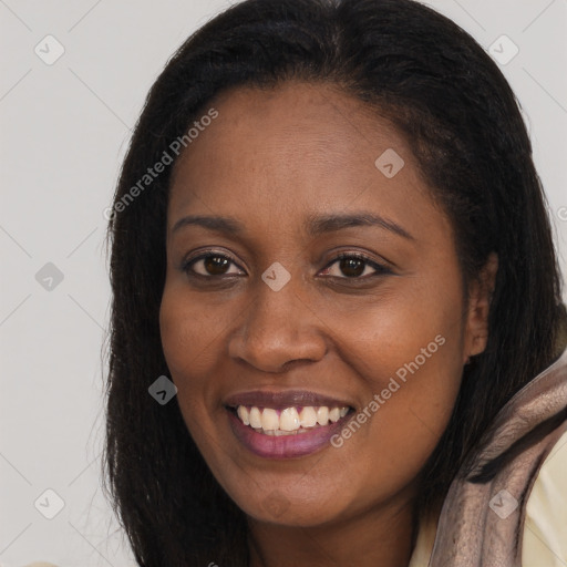 Joyful latino young-adult female with long  brown hair and brown eyes