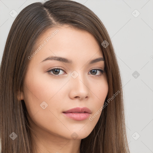 Neutral white young-adult female with long  brown hair and brown eyes