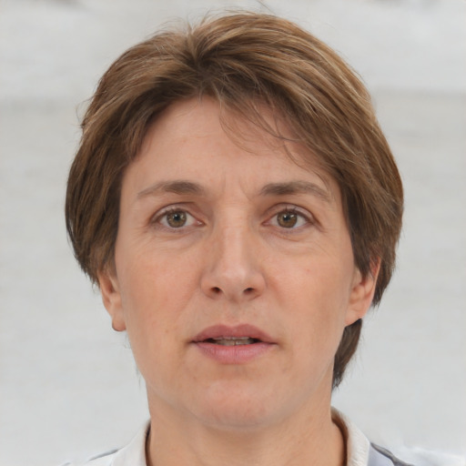 Neutral white adult female with short  brown hair and brown eyes