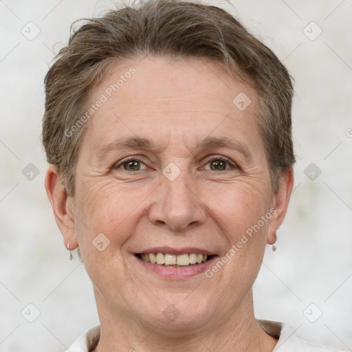 Joyful white adult female with short  brown hair and grey eyes