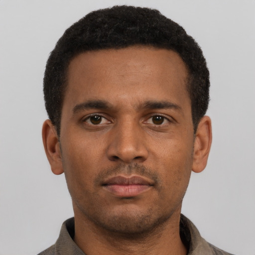 Neutral latino young-adult male with short  brown hair and brown eyes