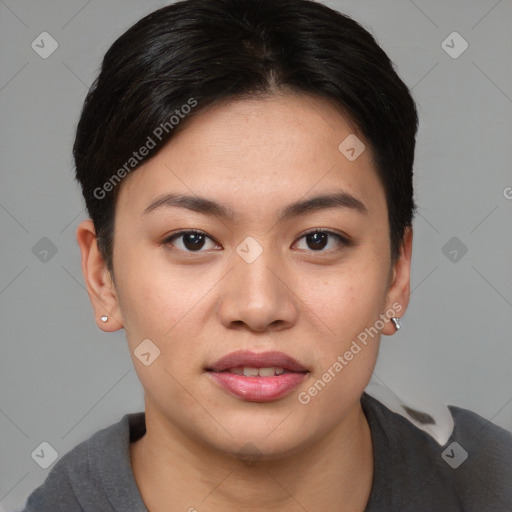Joyful asian young-adult female with short  brown hair and brown eyes