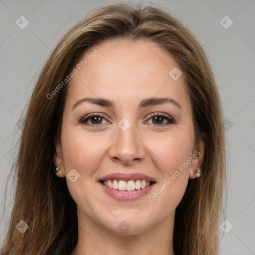 Joyful white young-adult female with long  brown hair and grey eyes