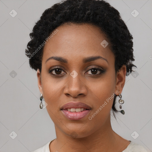 Joyful black young-adult female with short  black hair and brown eyes