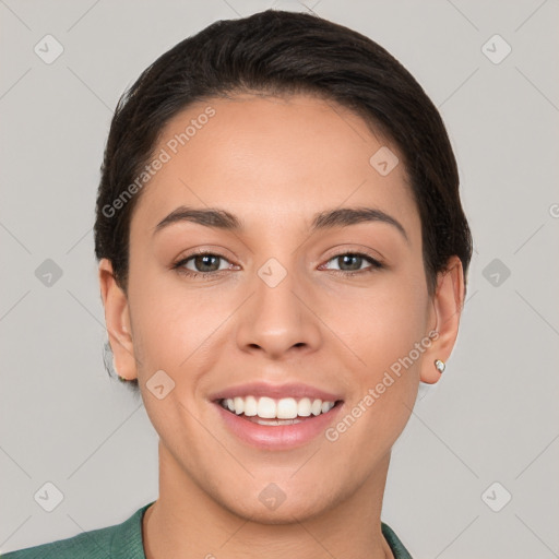 Joyful white young-adult female with short  brown hair and brown eyes