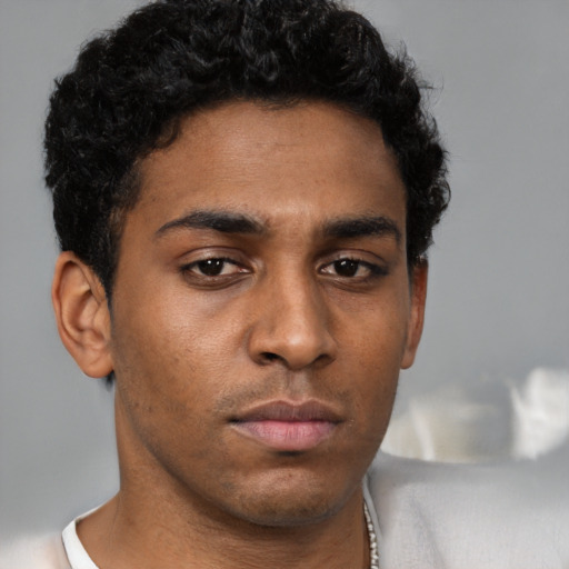 Neutral black young-adult male with short  brown hair and brown eyes