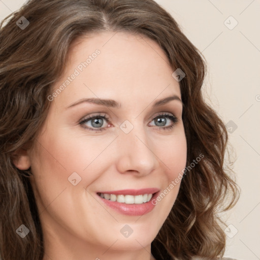 Joyful white young-adult female with long  brown hair and green eyes