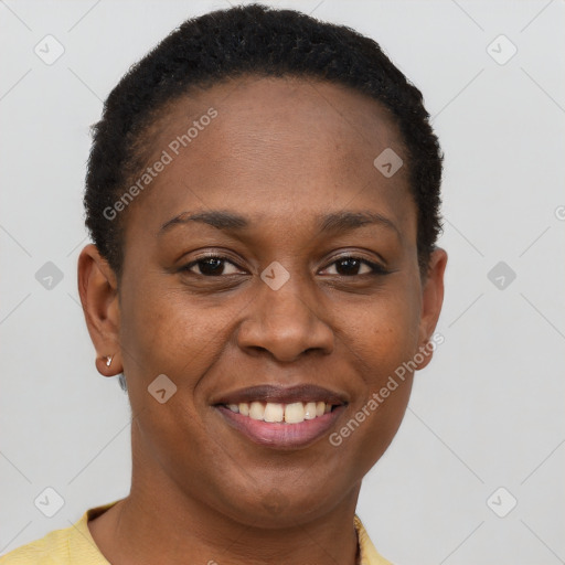 Joyful black young-adult female with short  brown hair and brown eyes