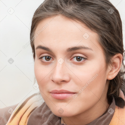 Neutral white young-adult female with medium  brown hair and brown eyes